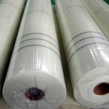 Two rolls of white construction fiberglass cloth